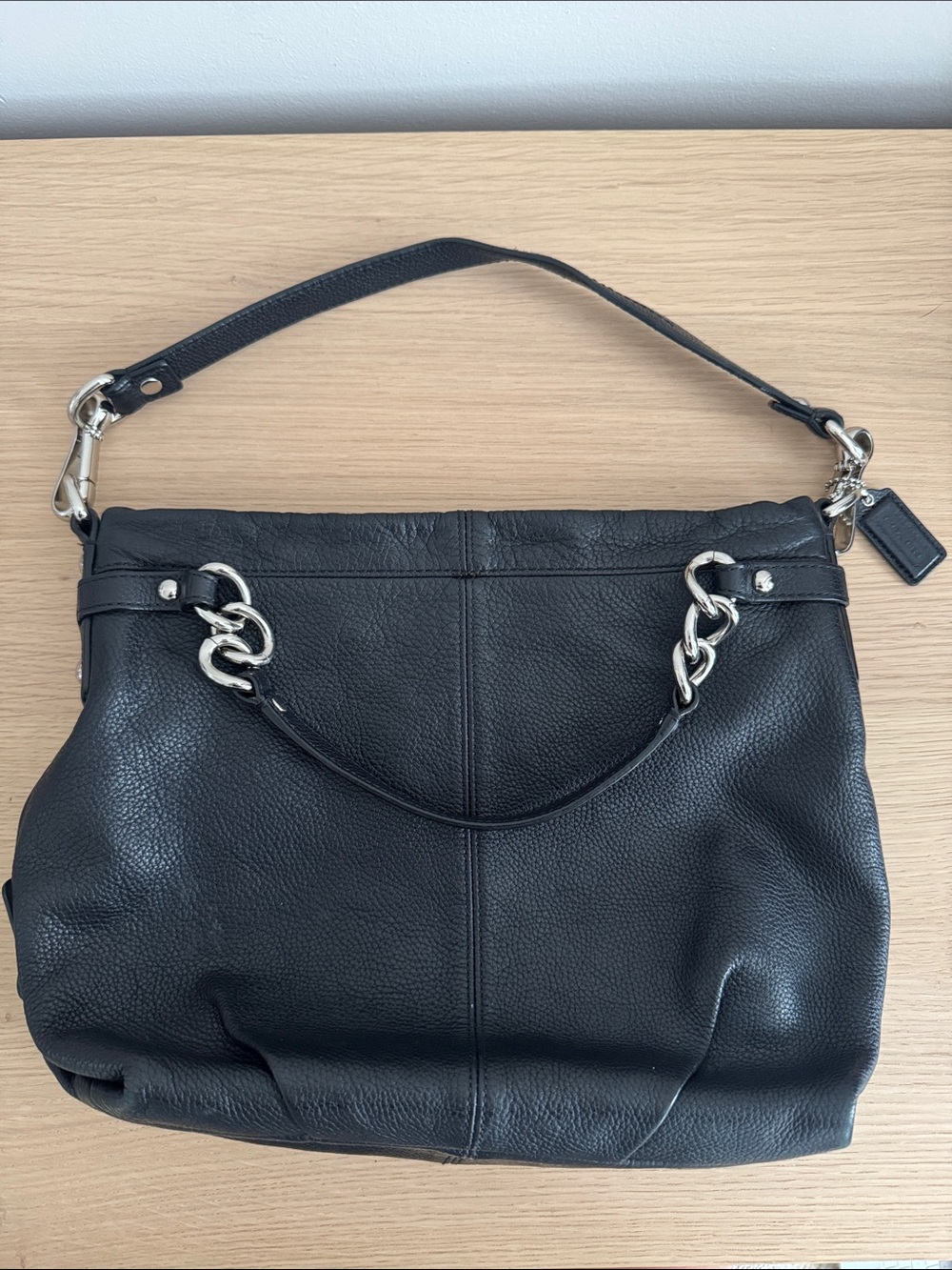 Black Coach shoulder bag with silver hardware